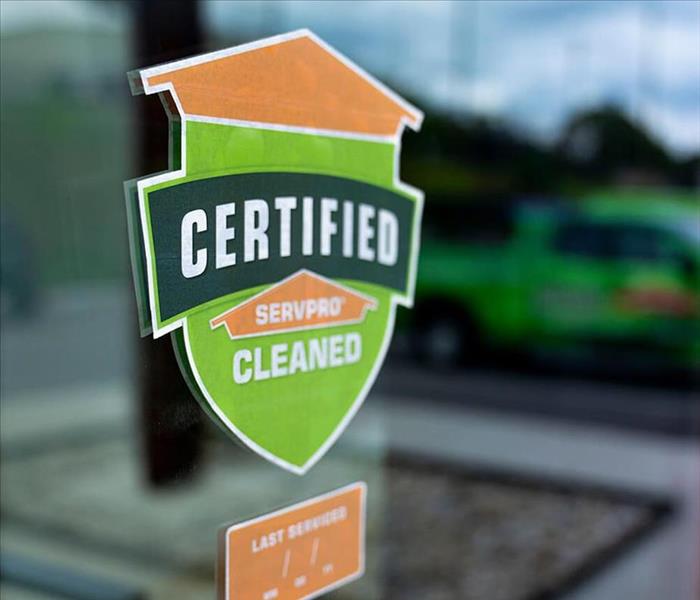 Certified: SERVPRO Cleaned decal on window of business